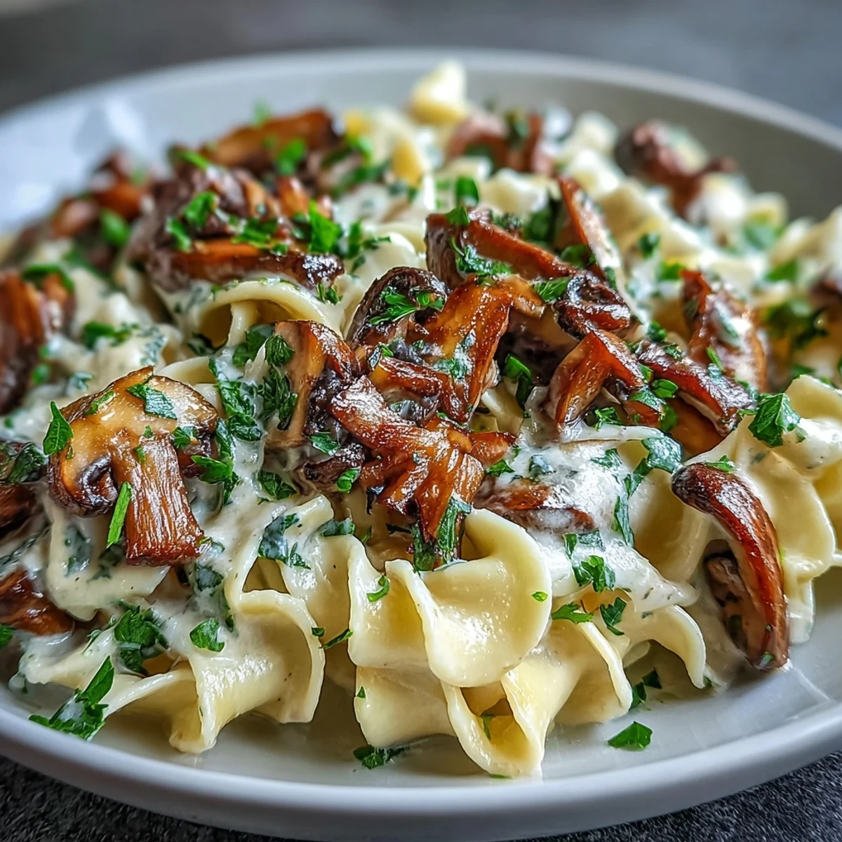A hearty vegetarian Creamy Mushroom Stroganoff with rich, umami flavors and a silky, creamy sauce.