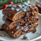 GingerBrave Cookie Run Kingdom gingerbread bites on a rustic baking tray, decorated with royal icing to resemble the beloved game character.