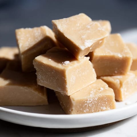 Creamy peanut butter fudge squares, perfectly chilled and ready to satisfy your sweet tooth cravings.