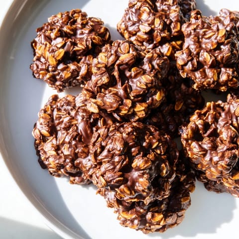 These easy no-bake chocolate oatmeal drop cookies are piled high, promising a quick, chocolatey treat.