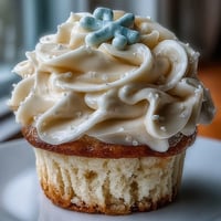 Soft vanilla Cancer Birthday Cupcakes with shimmering pearl fondant toppers await.